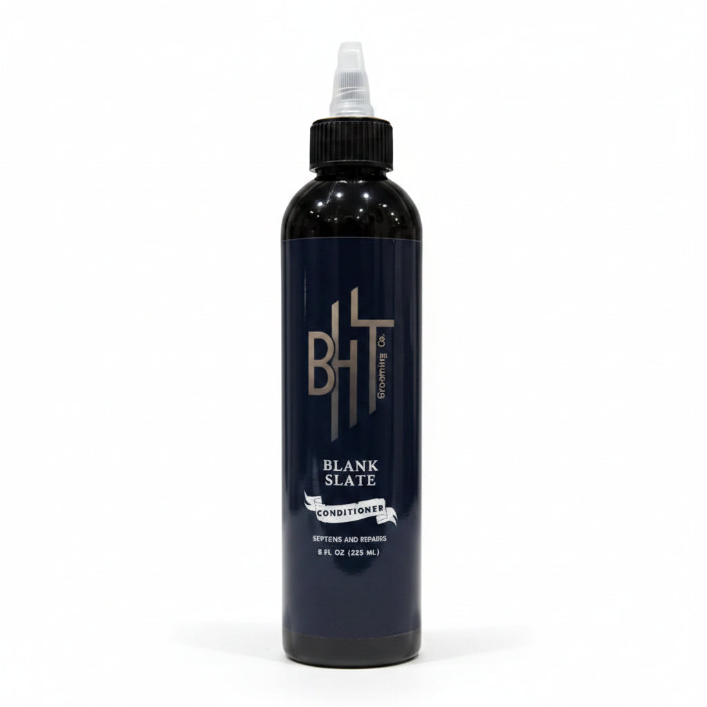 Black bottle with a label on a gray background