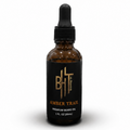 Brown bottle with black cap labeled 'Amber Trail' on a white background