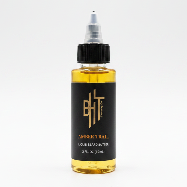 BHT Grooming Amber Trail Liquid Beard Butter in a 2 fl oz bottle with premium nourishing butters and oils to soften, condition, moisturize, and strengthen beards while promoting a healthy, natural shine.