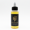 BHT Grooming Bald Tobacconist Liquid Beard Butter in a 2 fl oz bottle. Premium beard conditioner formulated to deeply moisturize, soften, and strengthen facial hair with a rich masculine fragrance of tobacco leaf and warm smoke.