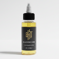 BHT Grooming Blacktop Noir Liquid Beard Butter in a 2 fl oz bottle. Premium beard conditioner that deeply moisturizes, softens, and strengthens facial hair with a bold masculine fragrance featuring riding leather, engine oil, and smoky notes.