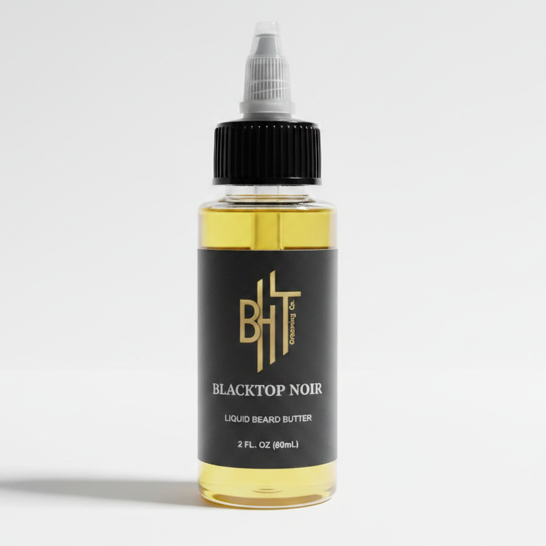 BHT Grooming Blacktop Noir Liquid Beard Butter in a 2 fl oz bottle. Premium beard conditioner that deeply moisturizes, softens, and strengthens facial hair with a bold masculine fragrance featuring riding leather, engine oil, and smoky notes.