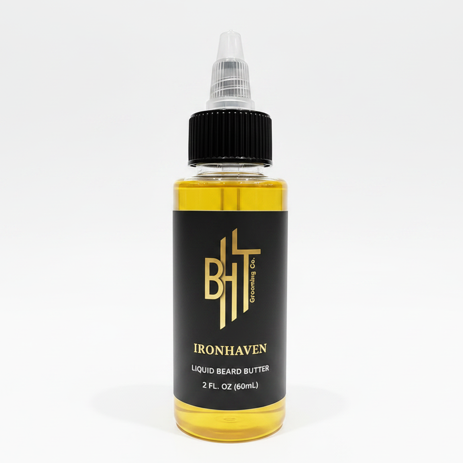 BHT Grooming IronHaven Liquid Beard Butter in a 2 fl oz bottle. Premium liquid beard conditioner formulated to moisturize, soften, strengthen, and nourish facial hair while reducing beard itch, dryness, and beard dandruff for a fuller, healthier beard.
