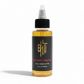 BHT Grooming Midnight Current Liquid Beard Butter in a 2 fl oz bottle. Premium beard conditioner formulated to deeply moisturize, soften, and strengthen facial hair with an invigorating masculine fragrance of bright mandarin, citrus, saffron, cedar, vetiver, and warm amber.