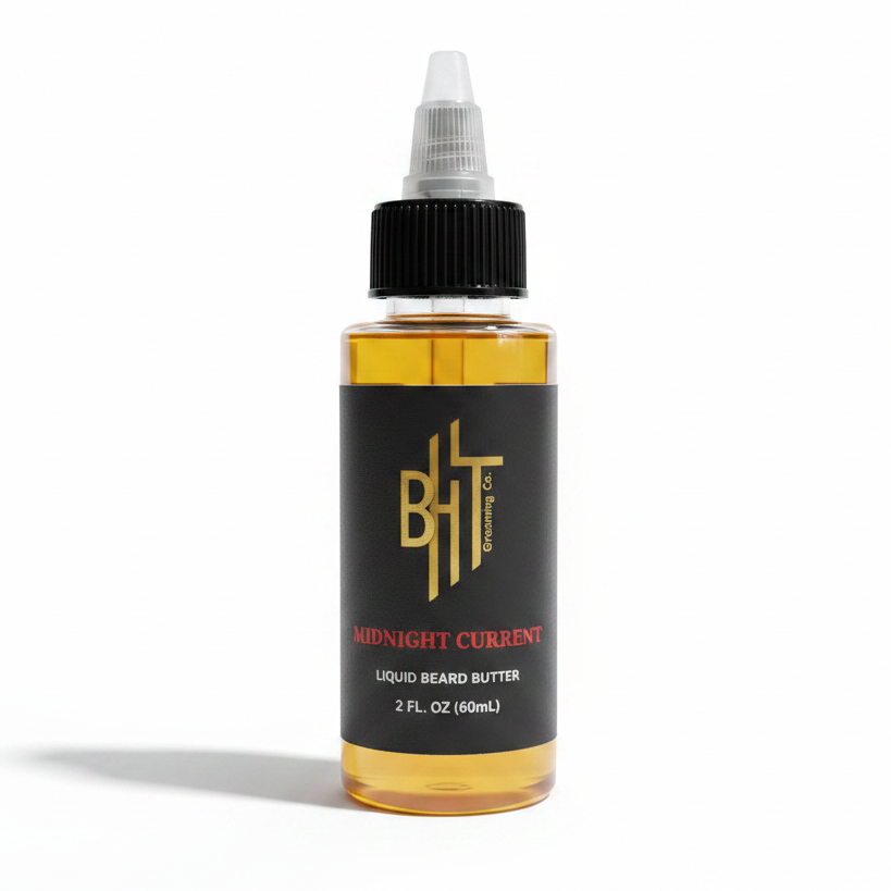 BHT Grooming Midnight Current Liquid Beard Butter in a 2 fl oz bottle. Premium beard conditioner formulated to deeply moisturize, soften, and strengthen facial hair with an invigorating masculine fragrance of bright mandarin, citrus, saffron, cedar, vetiver, and warm amber.
