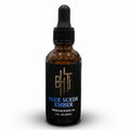 Bottle of Blue Suede Ember premium beard oil on a white background