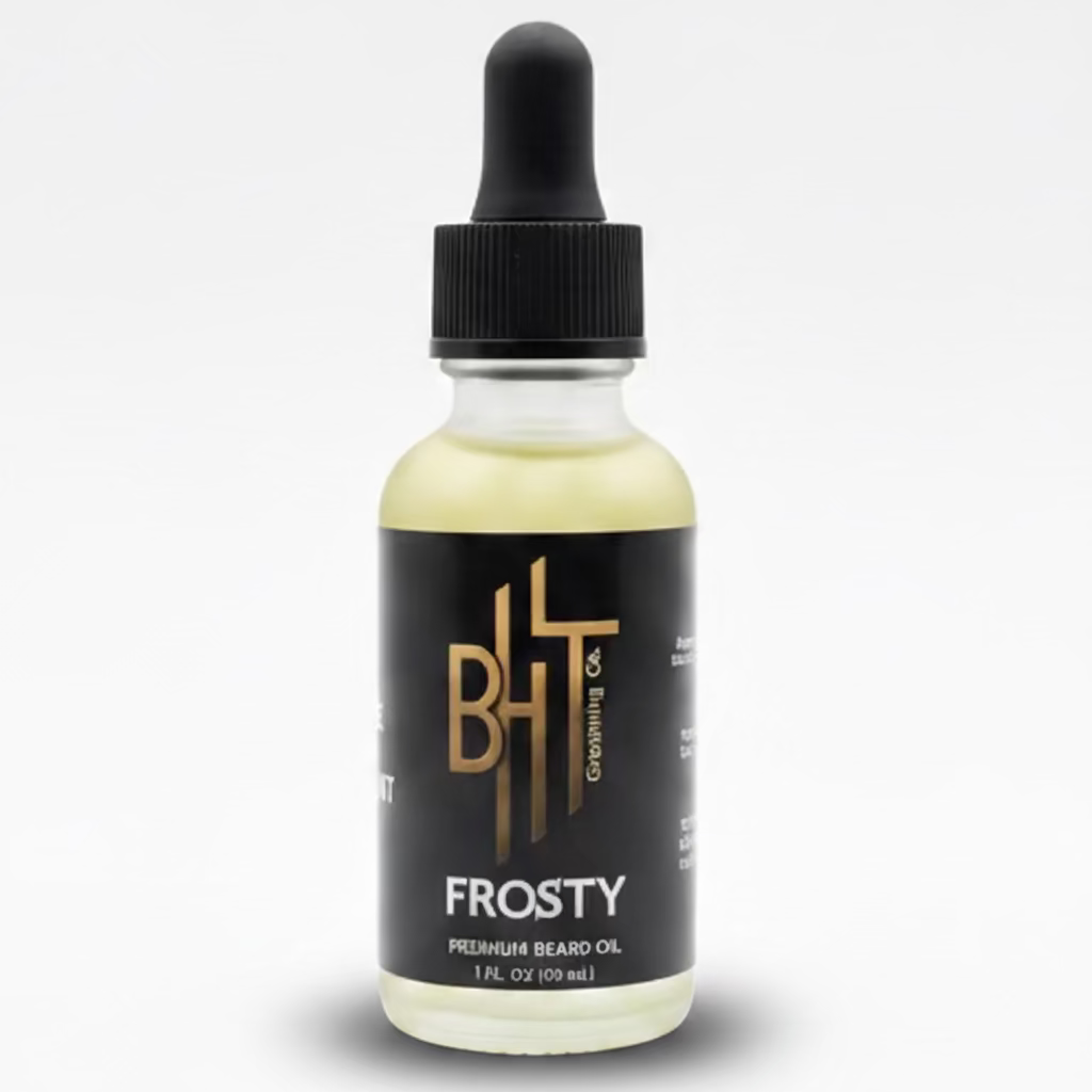 A small bottle of Frosty Premium Beard Oil by BHT Grooming. The bottle is a frosted white glass dropper bottle with a pale yellow-golden oil with a black dropper cap and a black label featuring gold and white text.