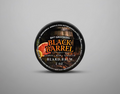Round tin of beard balm on a shelf