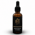 Brown glass bottle with black cap labeled 'Ironhaven Premium Beard Oil' on a white background