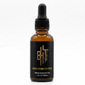 signature status beard oil bottle from bht grooming on a white background